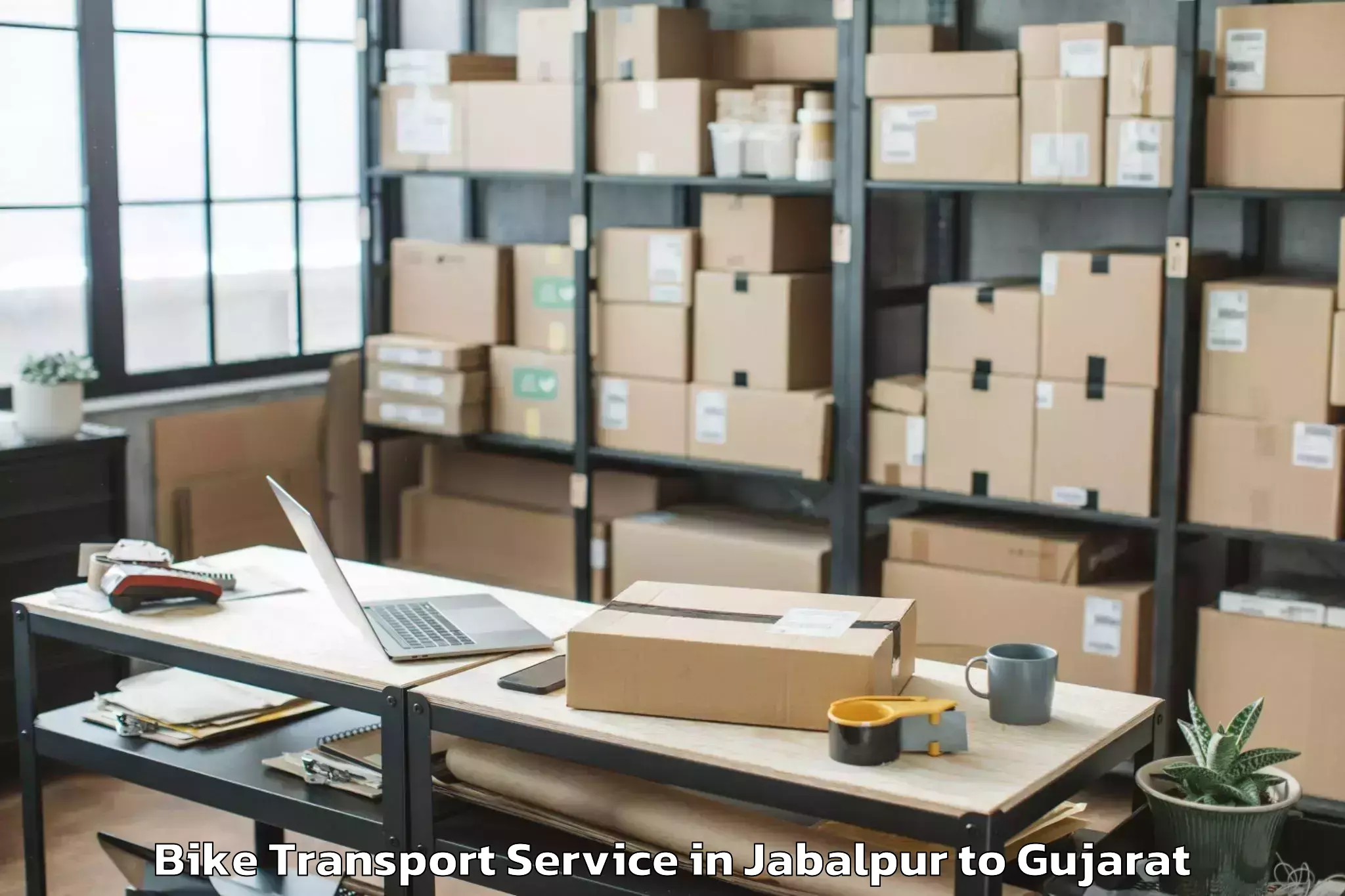 Reliable Jabalpur to Kamrej Bike Transport